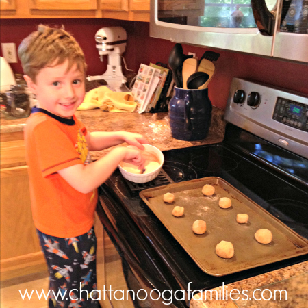 child helping cook